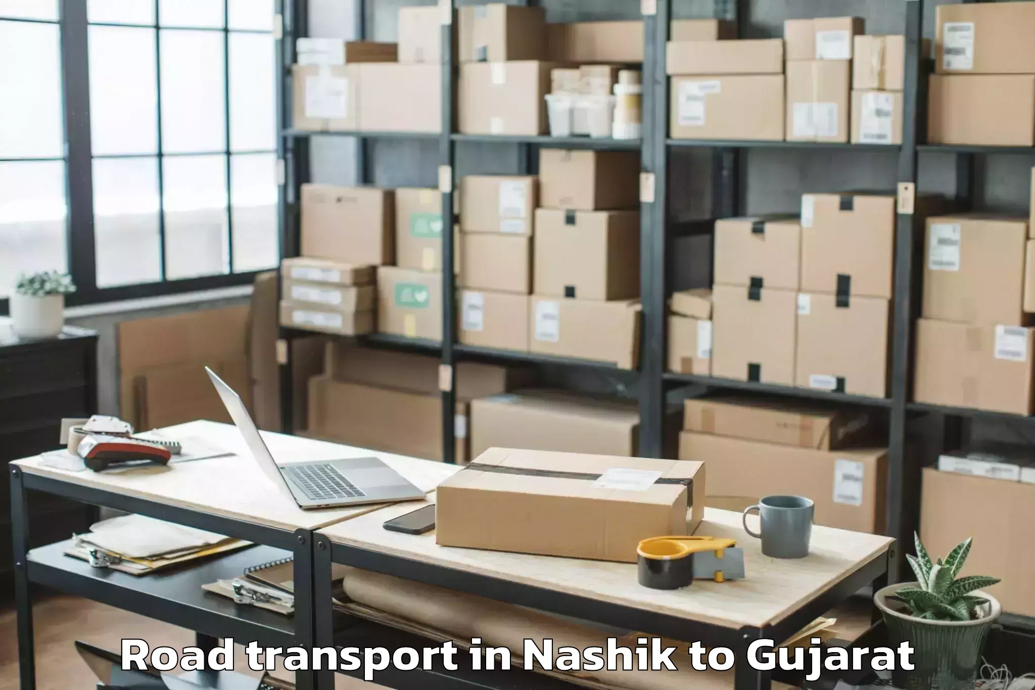 Book Nashik to Karnavati University Gandhinag Road Transport